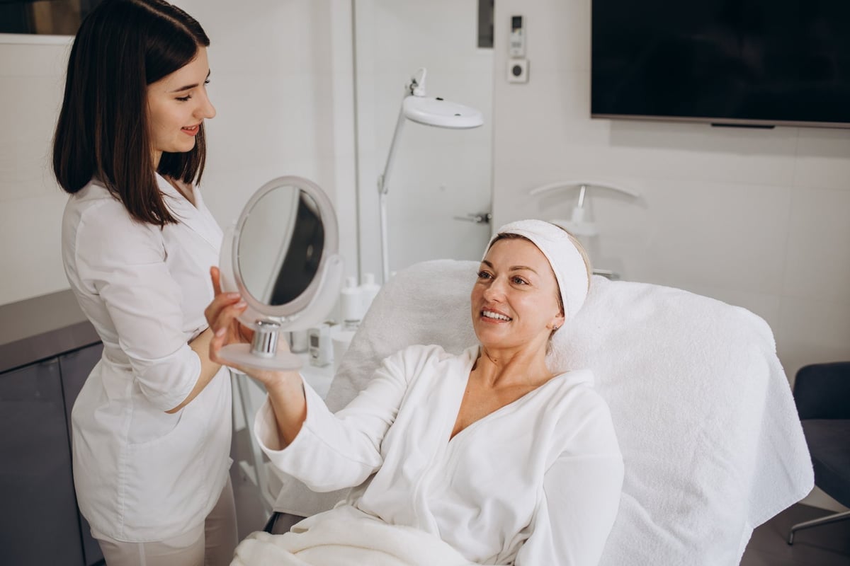 Patient coordinator talking with a patient in a clinic